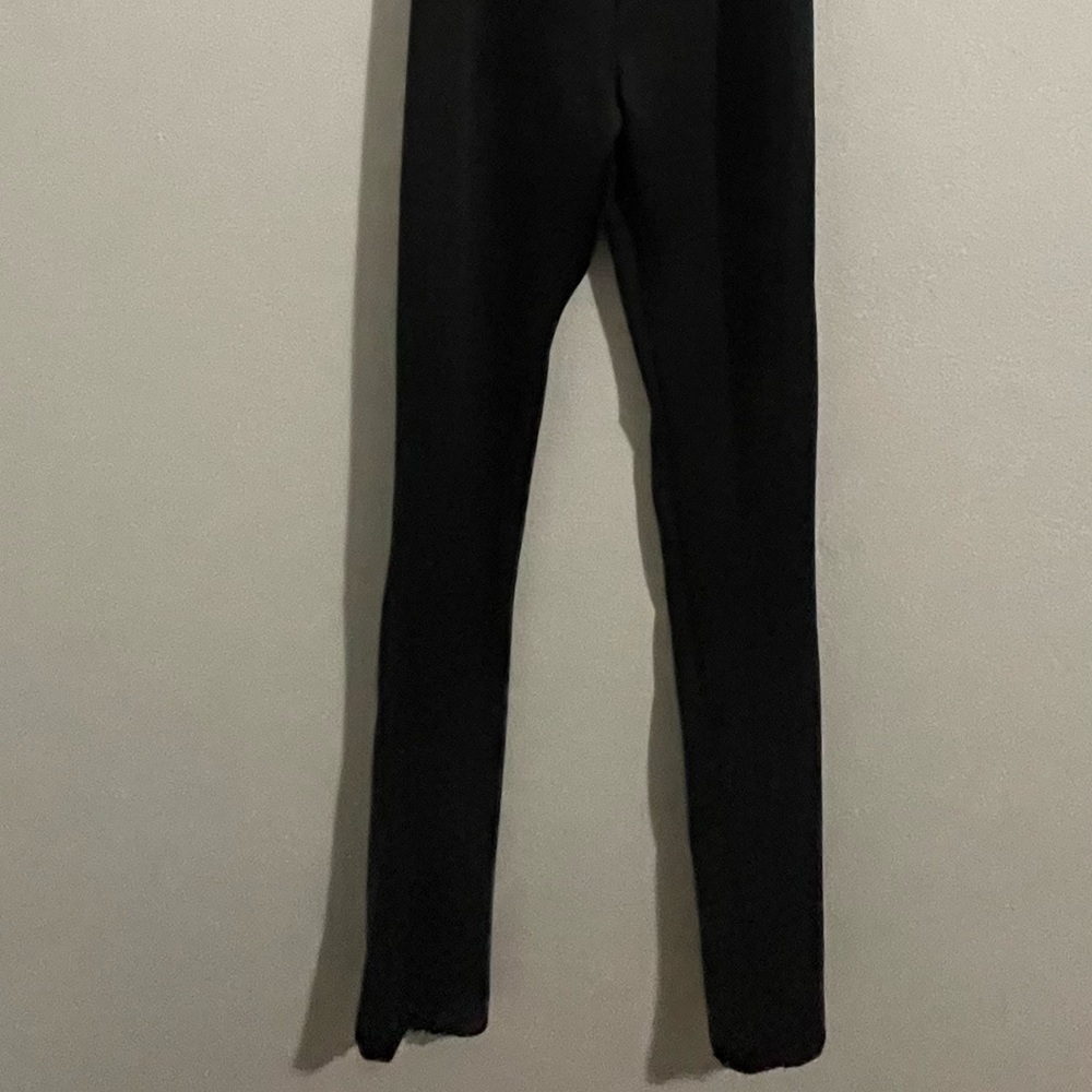 Black body suit. Open back & open in front. Size: Small. Original Price: $36.90